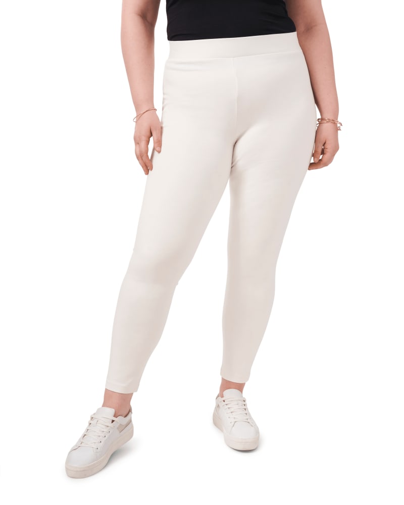 Front of a model wearing a size 1X PONTE LEGGING in VANILLA by Vince Camuto. | dia_product_style_image_id:261560
